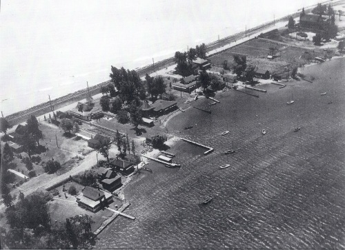 Aerial view of Erieau, Ontario showing the C&O mainline and coal dock yard lead trackage running alongside Mariner's Road where young Geoff travelled with Grandma Franklin, circa 1950's.  Source: redheadkb.blogspot.ca/
